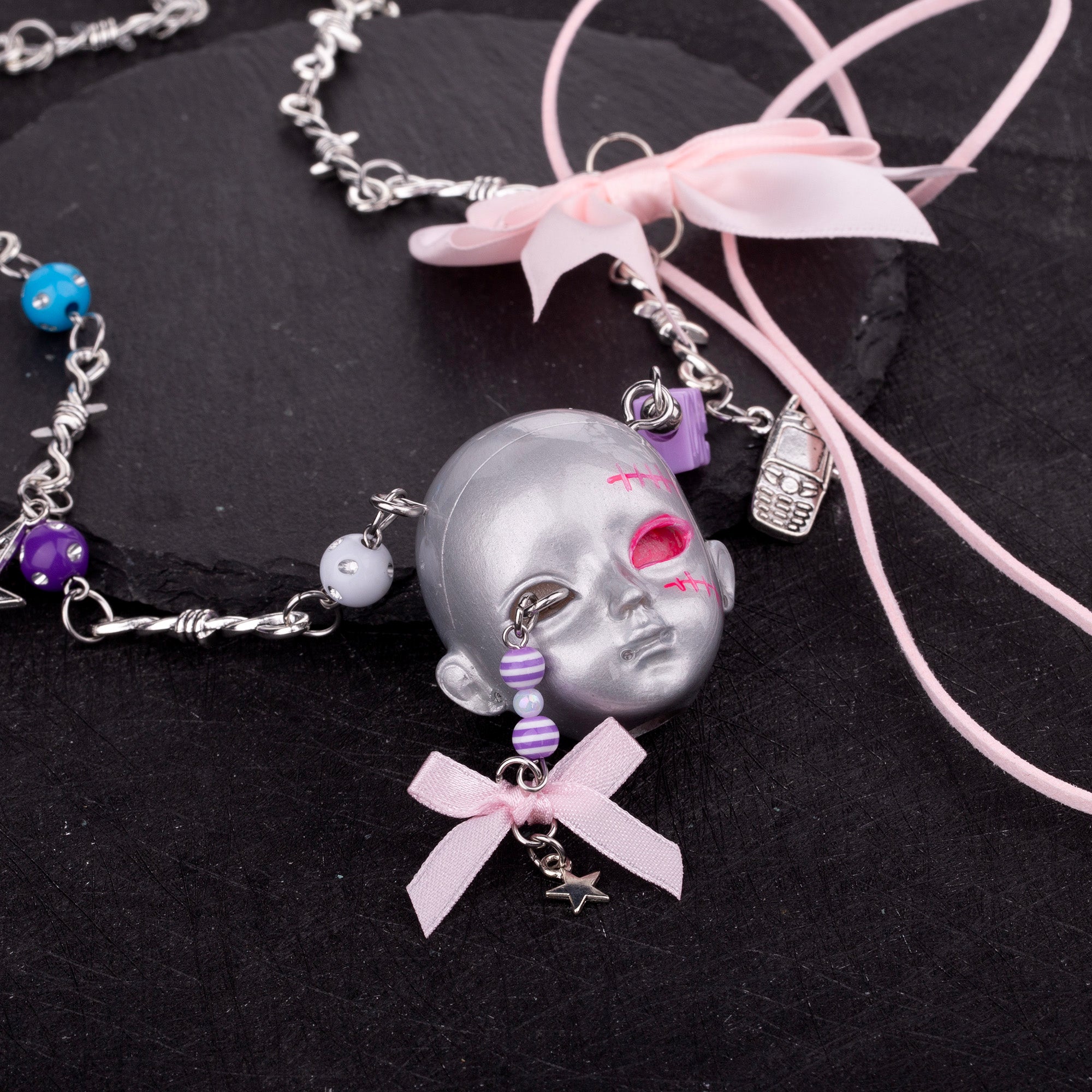 Bow Doll Head Necklace