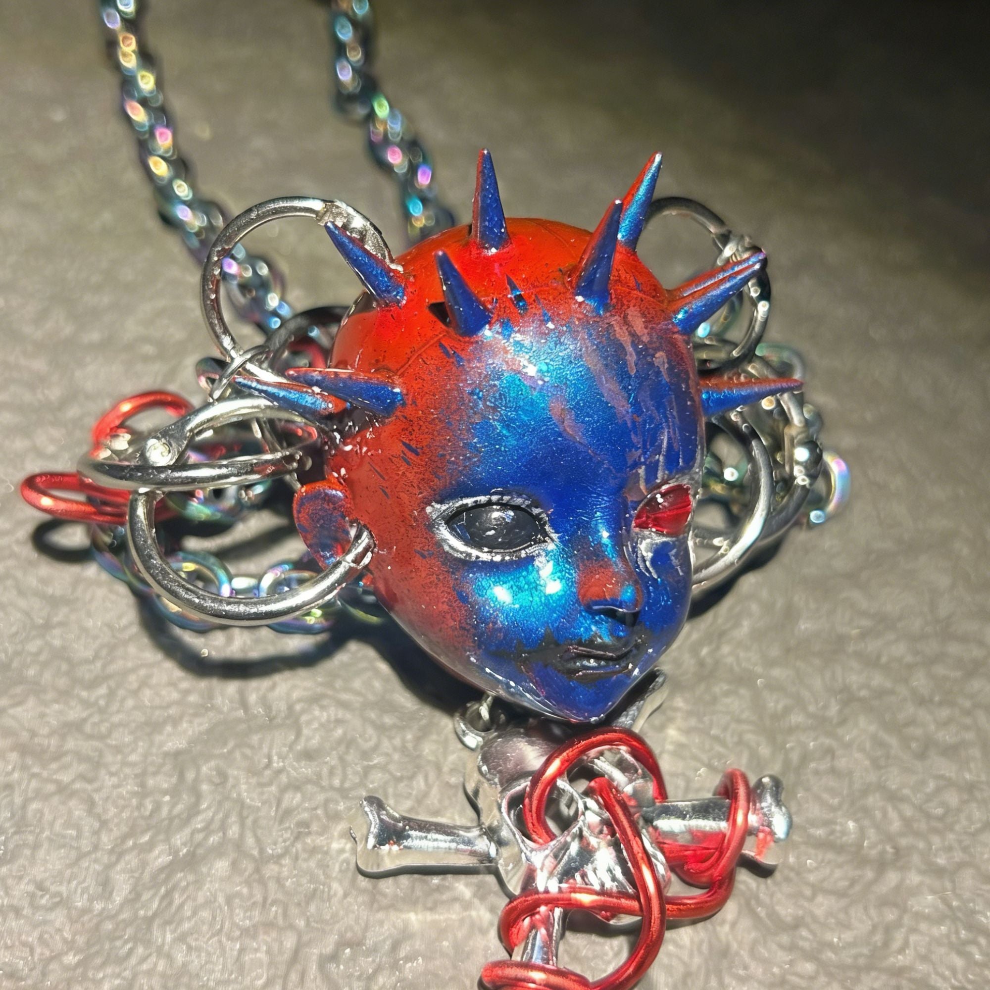 Rivet hip-hop kid head necklace