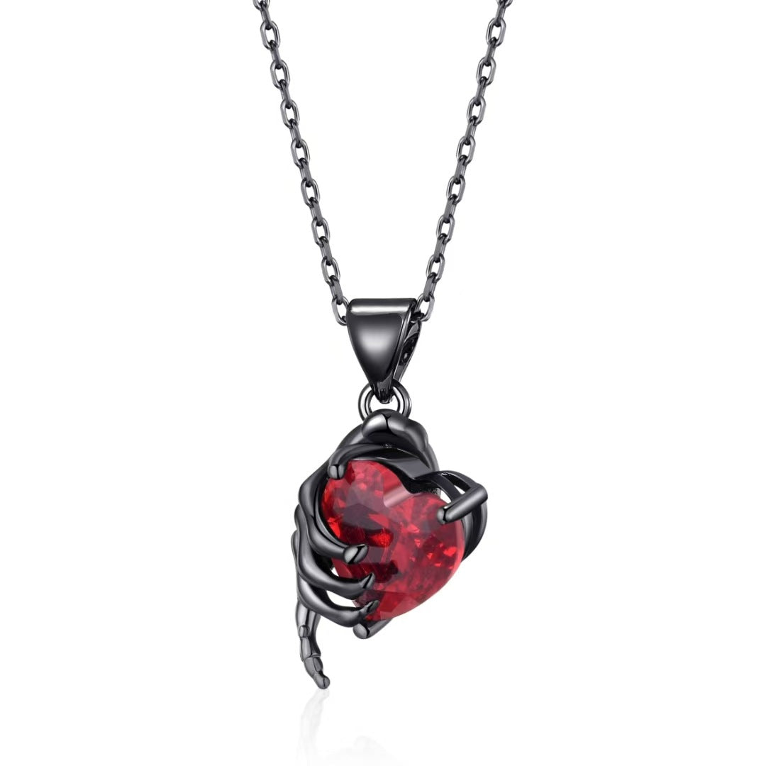 Gothic Hand Holding Red Heart Gemstone Necklace