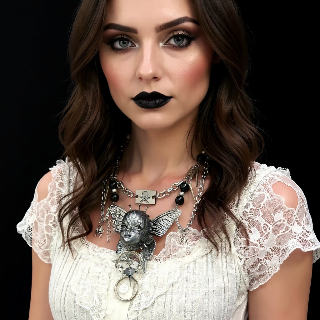 Gothic metal doll head necklace