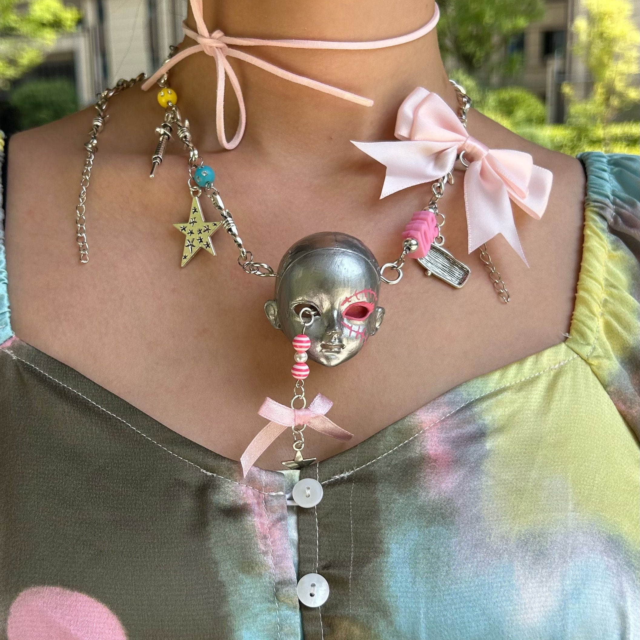 Bow doll head choker