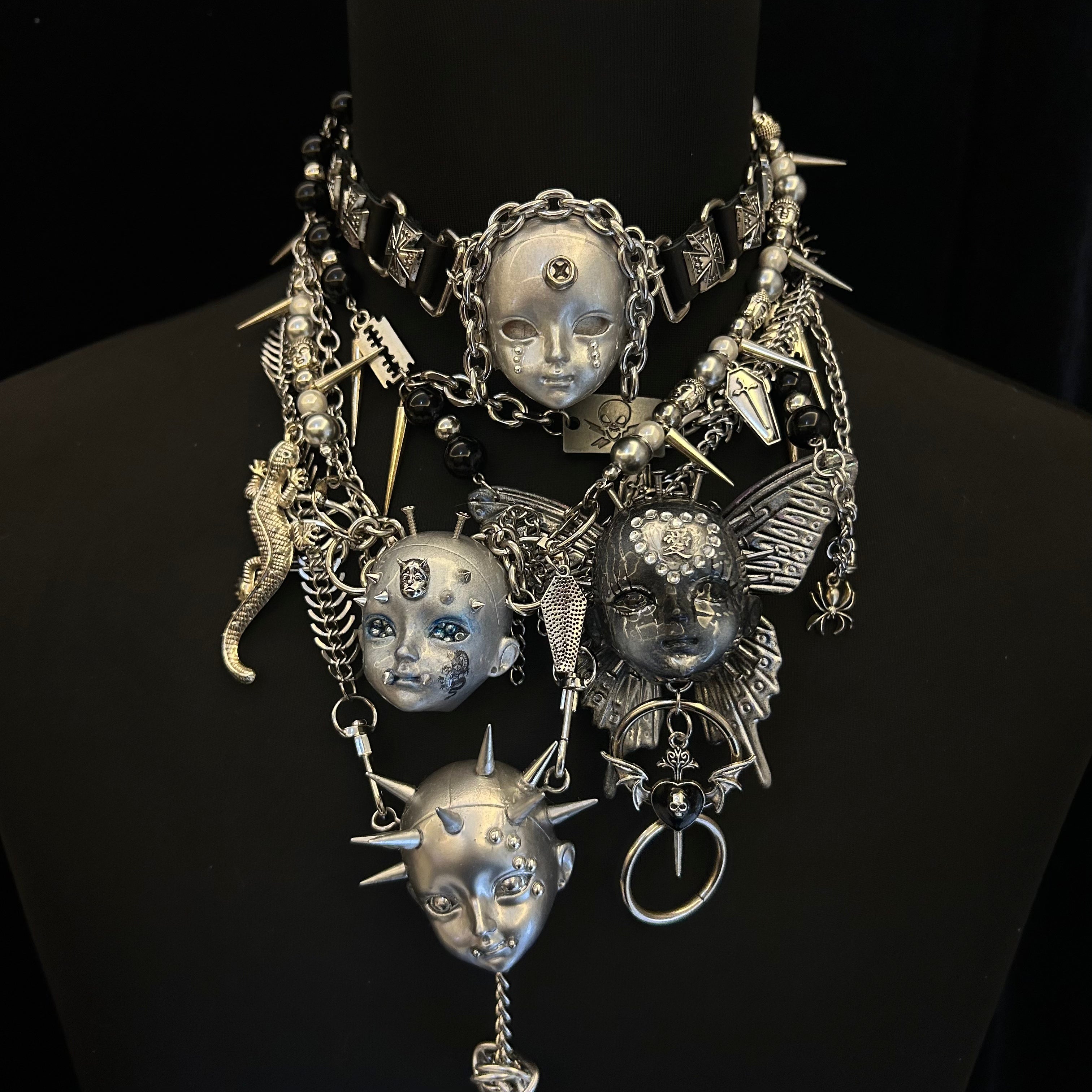 Gothic metal doll head necklace